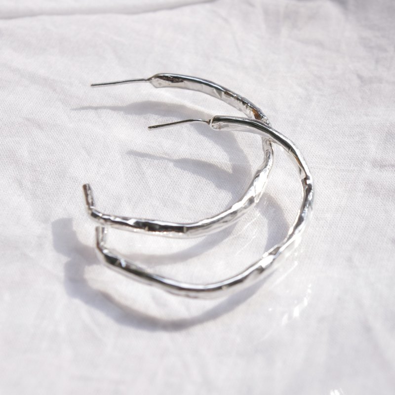 Irregular twisted silver earrings