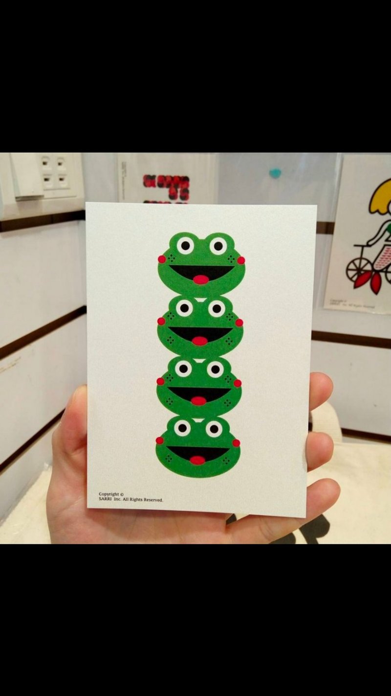Four frogs open card