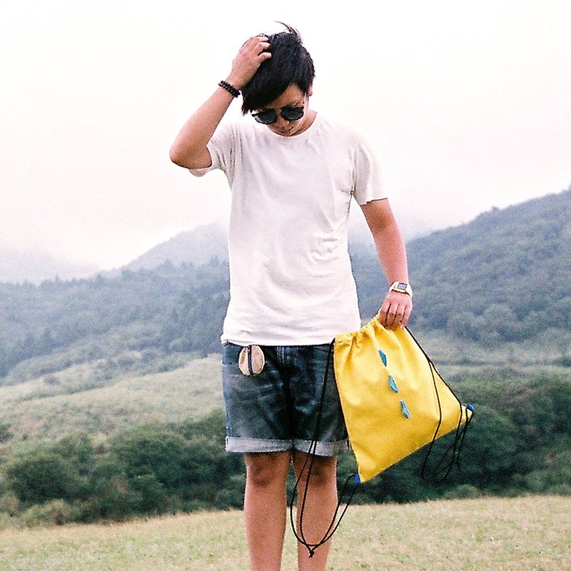 Monster drawstring backpack / yellow canvas - กระเป๋าหูรูด - วัสดุอื่นๆ สีเหลือง