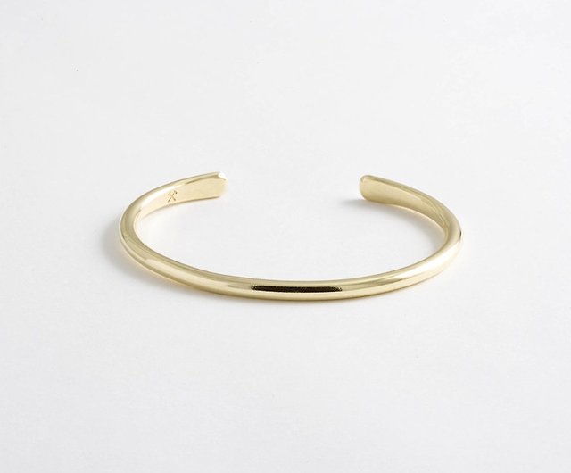 HERMÈS Cuff Bracelet in enameled gold metal
