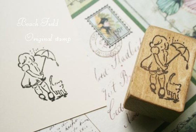A girl holding an umbrella on a cat so as not to get wet in the rain. - Stamps & Stamp Pads - Wood 