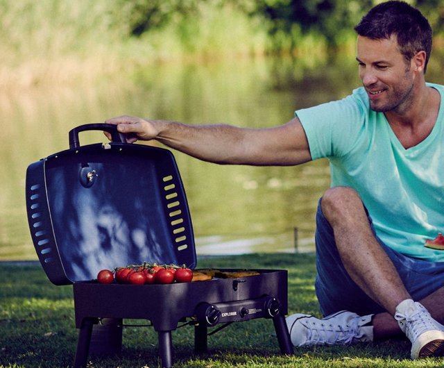 Gas grill with outlet storage