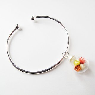 * Rosy Garden * Orange and yellow dried Daisies inisde glass ball on a sterling silver bangle