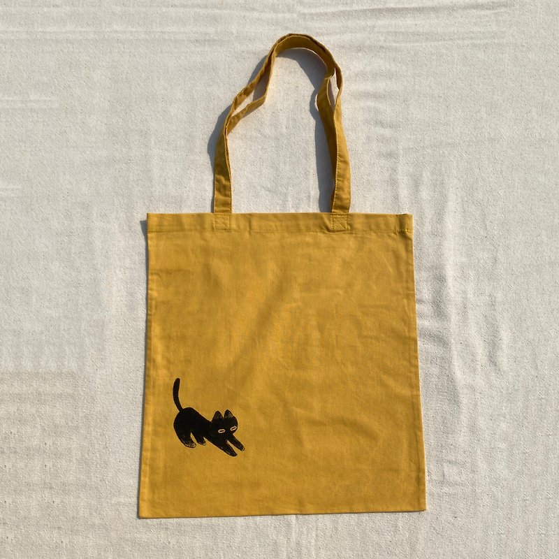懶腰黑貓 薑黃色 手工絹印帆布袋 - 手提包/手提袋 - 棉．麻 橘色