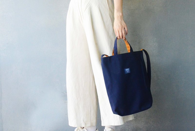 Two-color canvas three-purpose bag_ dark blue + orange - กระเป๋าแมสเซนเจอร์ - ผ้าฝ้าย/ผ้าลินิน สีน้ำเงิน