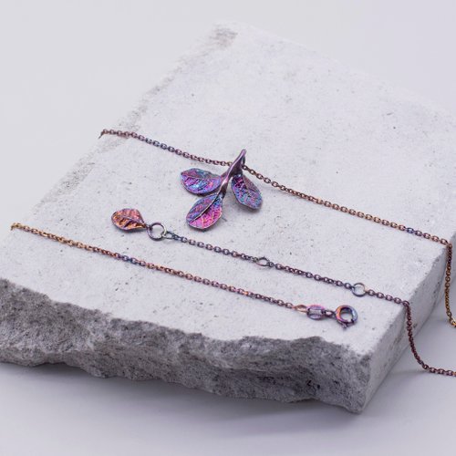 Patinas on sterling silver red flower loropetalum leaf necklace