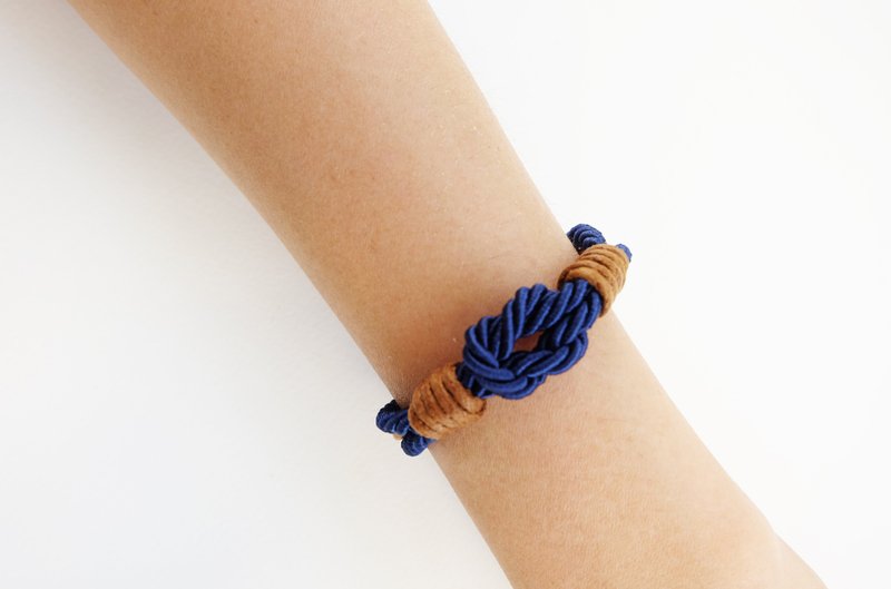 Navy blue tie the knot bracelet with brown waxed cotton cord - Bracelets - Paper Blue