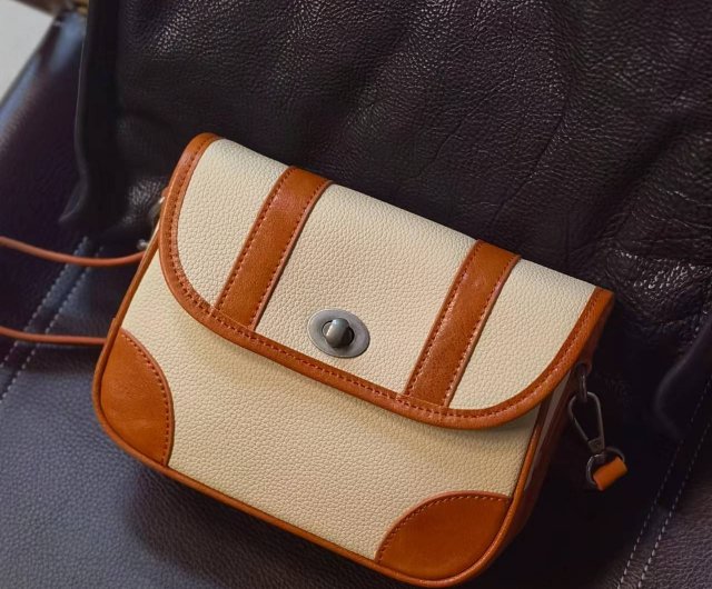 Side purse outlet backpack