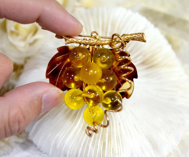 Antique on sale amber brooch