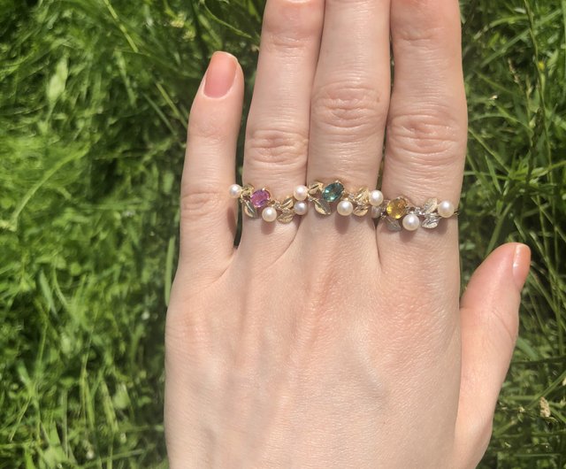 エメラルド、パール、ダイヤモンドをあしらったK14ゴールドリング