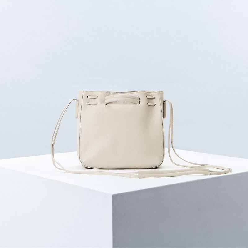 Clyde Cloud XS Leather Bucket Bag in Cream Color