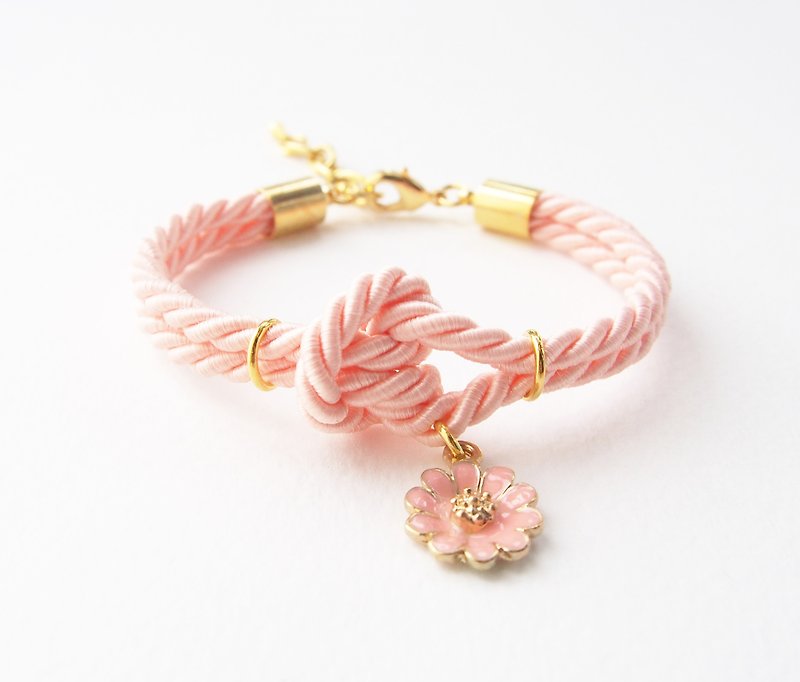 Peach knot rope bracelet + flower charm - สร้อยข้อมือ - วัสดุอื่นๆ สีส้ม
