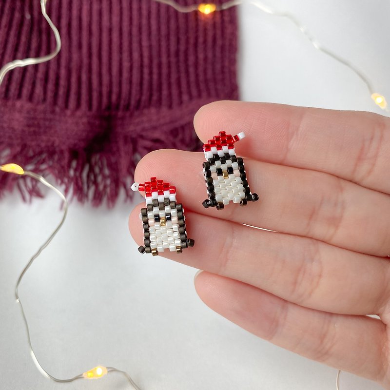 Christmas Penguins wearing Santa hat earrings