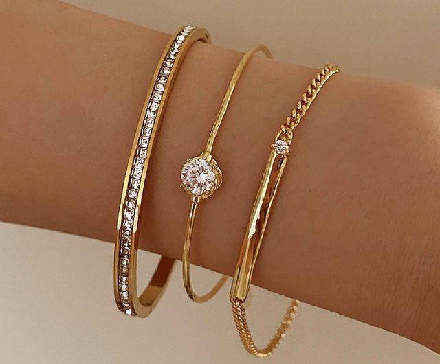 Women's solid gold on sale bangle