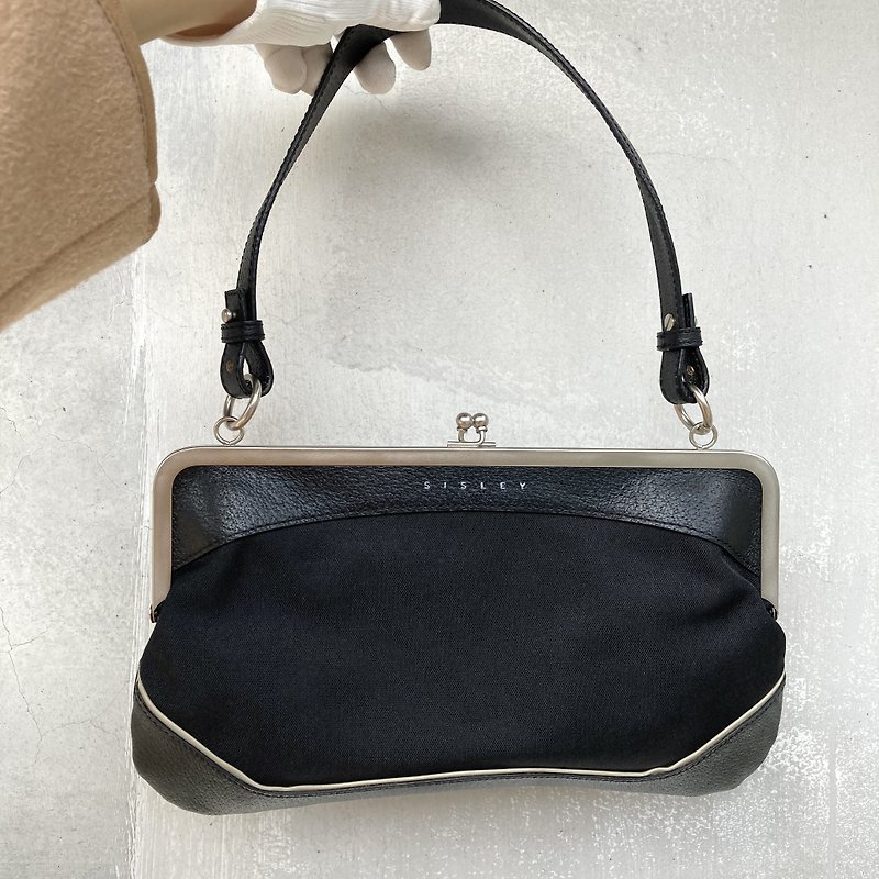 SISLEY Antique leather handbag under the armpit in black fabric with silver turnbuckle and contrasting white thread design - กระเป๋าถือ - วัสดุอื่นๆ สีดำ