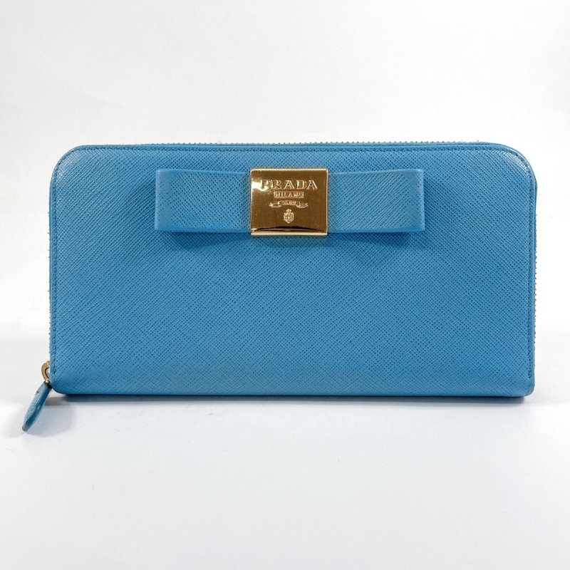 【日本直送 中古美品】プラダ PRADA 長財布 リボン サフィアーノレザー ブルー 12C ジッピーウォレット - 錢包/皮夾/長短夾 - 真皮 藍色