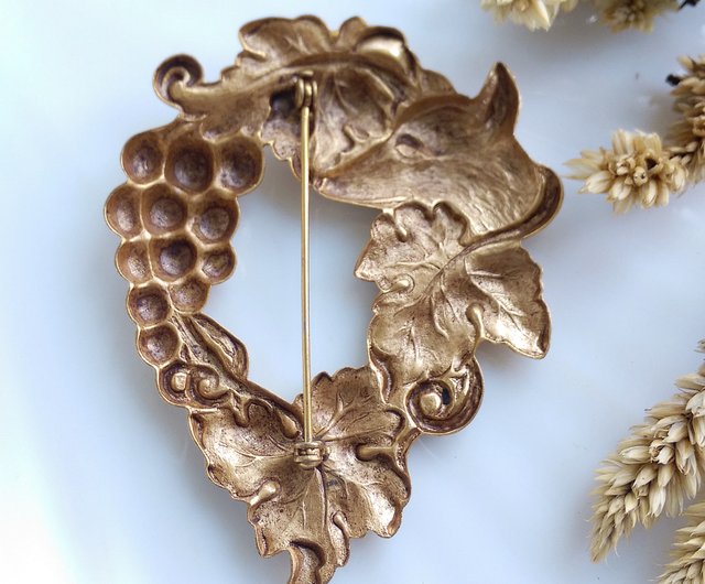 ヴィンテージジュエリー ウエスタンアンティークジュエリー 型押し狼と