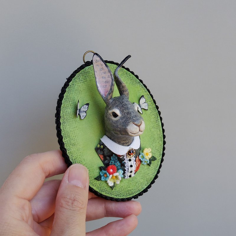 A rabbit wearing a small animal head dress - Stuffed Dolls & Figurines - Paper 