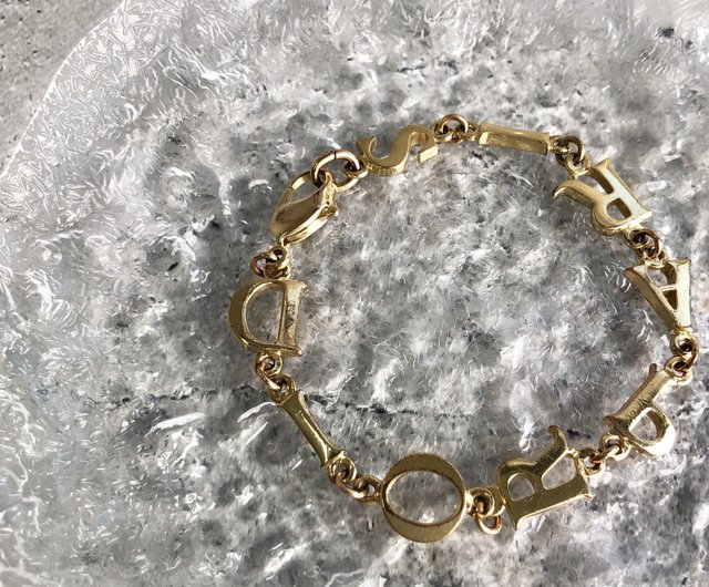 Christian Dior(クリスチャンディオール)ゴールドリボンブレスレット Christian Dior クリスチャンディオール ブレスレット リボン