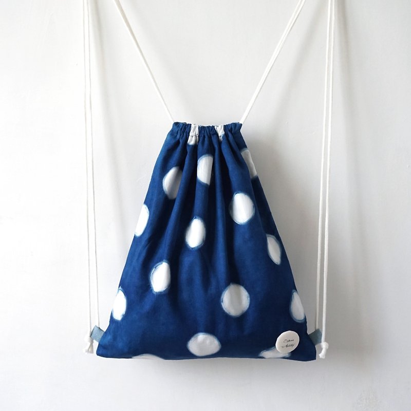 S.A x Macaron, Indigo dyed Handmade Dots Pattern Backpack - กระเป๋าหูรูด - ผ้าฝ้าย/ผ้าลินิน สีน้ำเงิน