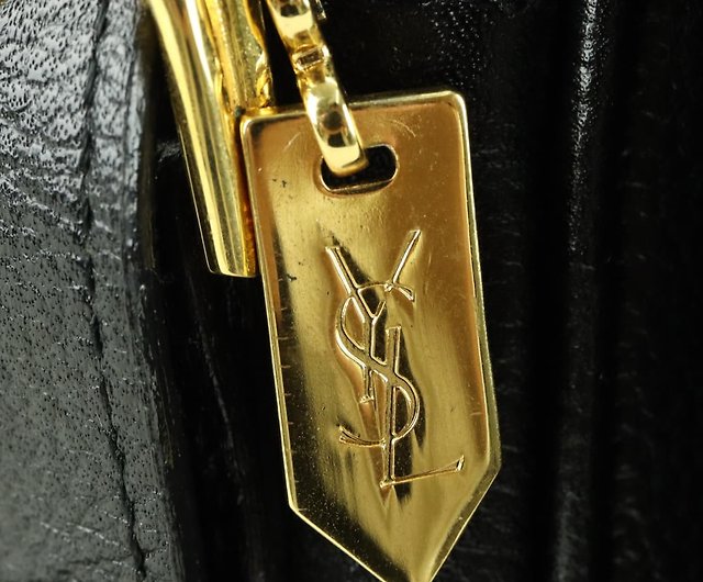【美品】イヴサンローラン ハンドバッグ ロゴ型押し　ゴールド金具　レザー　黒色リリーYSL