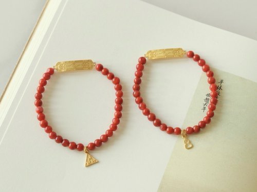 Red coral bracelet hot sale for baby meaning