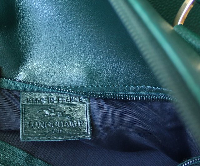 Vintage Longchamp navy leather shoulder bag with the embossed logo