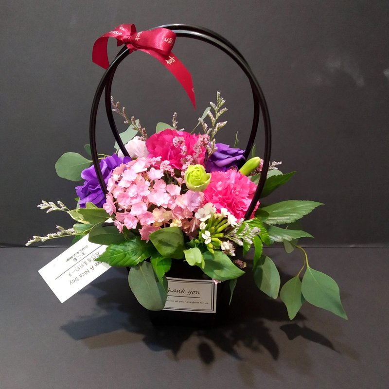 The beautiful and sweet flowers handheld flower gift is only available for delivery in the