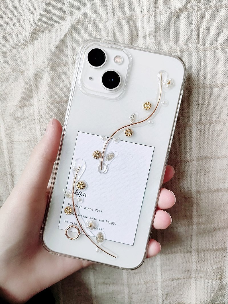 IPhone case with flowing flowers - เคส/ซองมือถือ - เรซิน สีทอง