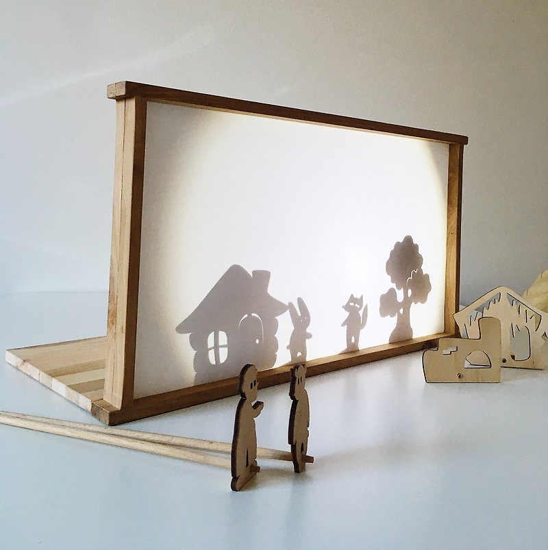 Table-top wooden shadow theater. Theatre screen for the marionette
