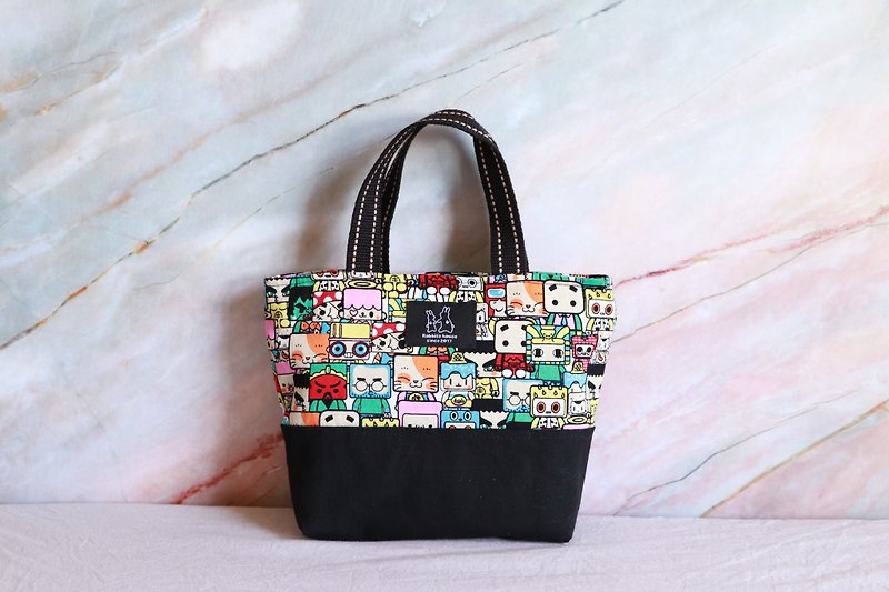 Cute emoticon print lightweight handbag - กระเป๋าถือ - ผ้าฝ้าย/ผ้าลินิน 