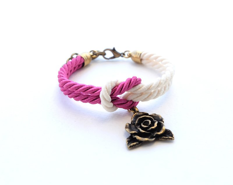 Fuchsia / Cream knot rope bracelet with rose charm - สร้อยข้อมือ - วัสดุอื่นๆ สึชมพู