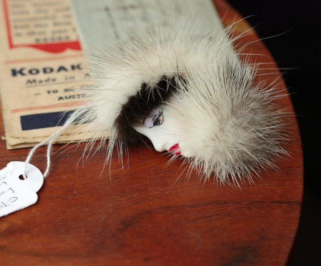 Fur brooch on sale