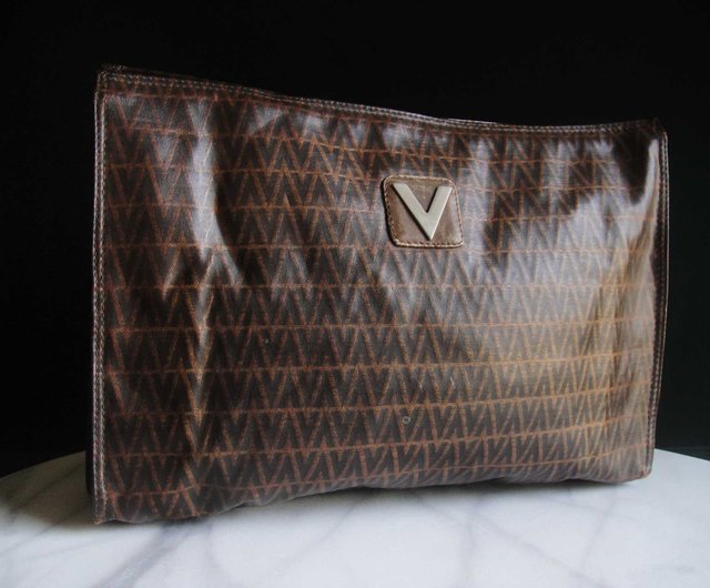 Mario valentino clutch bag deals