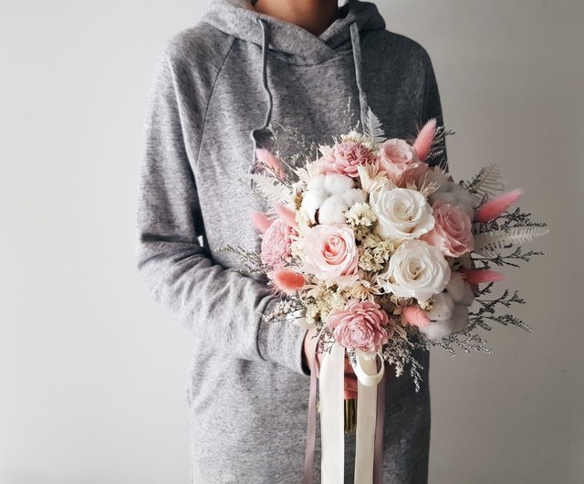 Pink and white immortal flower dry bouquet, bridal bouquet