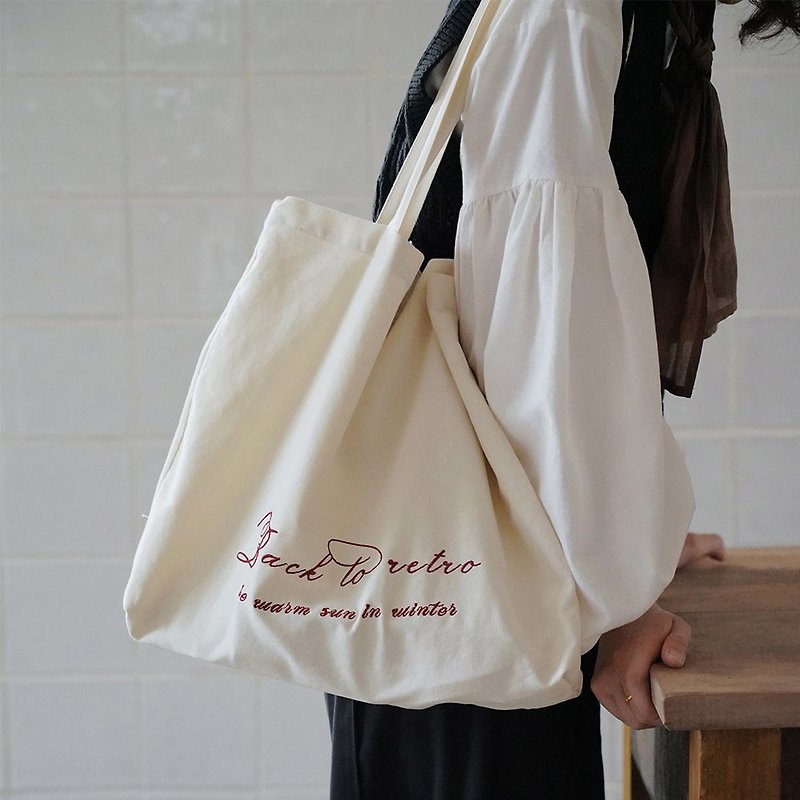 オフホワイトの刺繍入りプリントキャンバスバッグ|ショルダーバッグ|コットン| Life-015