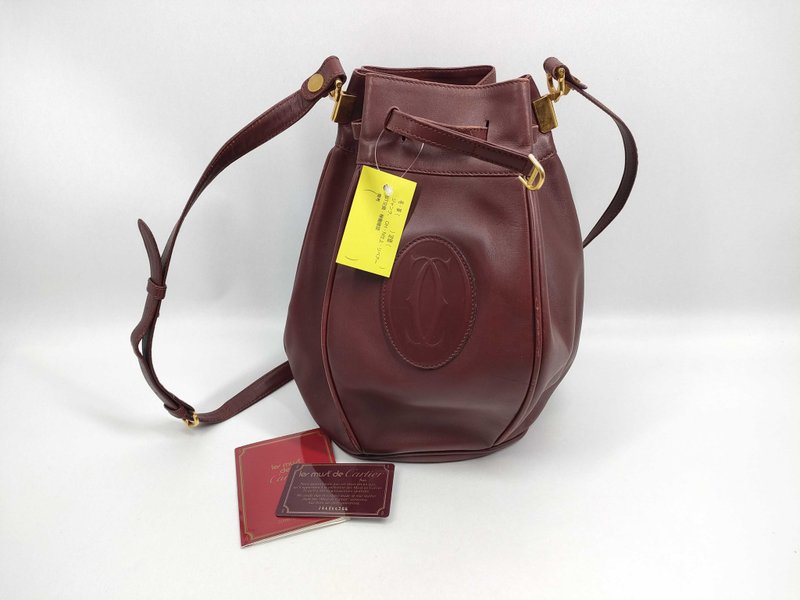 CARTIER MUST DE burgundy bucket drawstring side crossbody backpack Japanese second-hand - กระเป๋าแมสเซนเจอร์ - หนังแท้ สีแดง