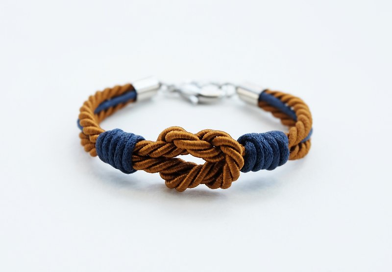 Brown tie the knot bracelet with navy blue waxed cotton cord - สร้อยข้อมือ - วัสดุอื่นๆ สีนำ้ตาล