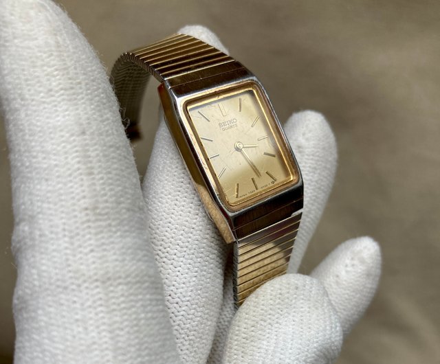 Seiko square hotsell gold watch