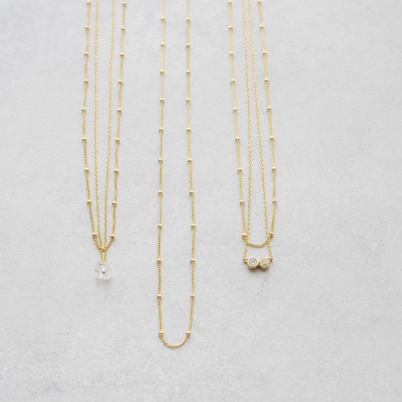 14kgf Delicate gold chain necklace with zirconia that has a cute back style Metal allergy compatible - สร้อยคอ - แก้ว 