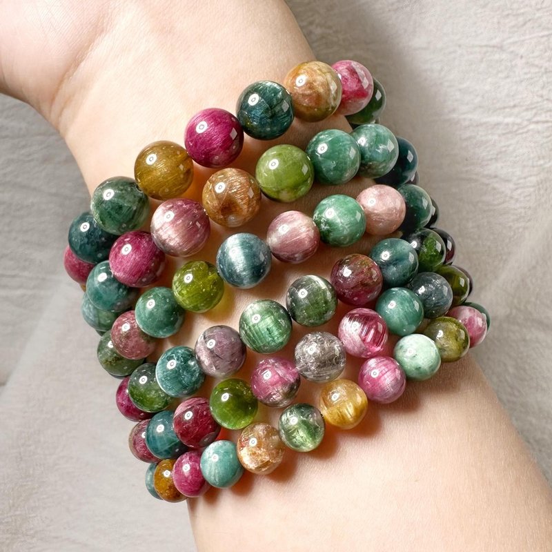 Graduation grade natural cat’s eye tourmaline worth 10,000 yuan - สร้อยข้อมือ - เครื่องเพชรพลอย หลากหลายสี