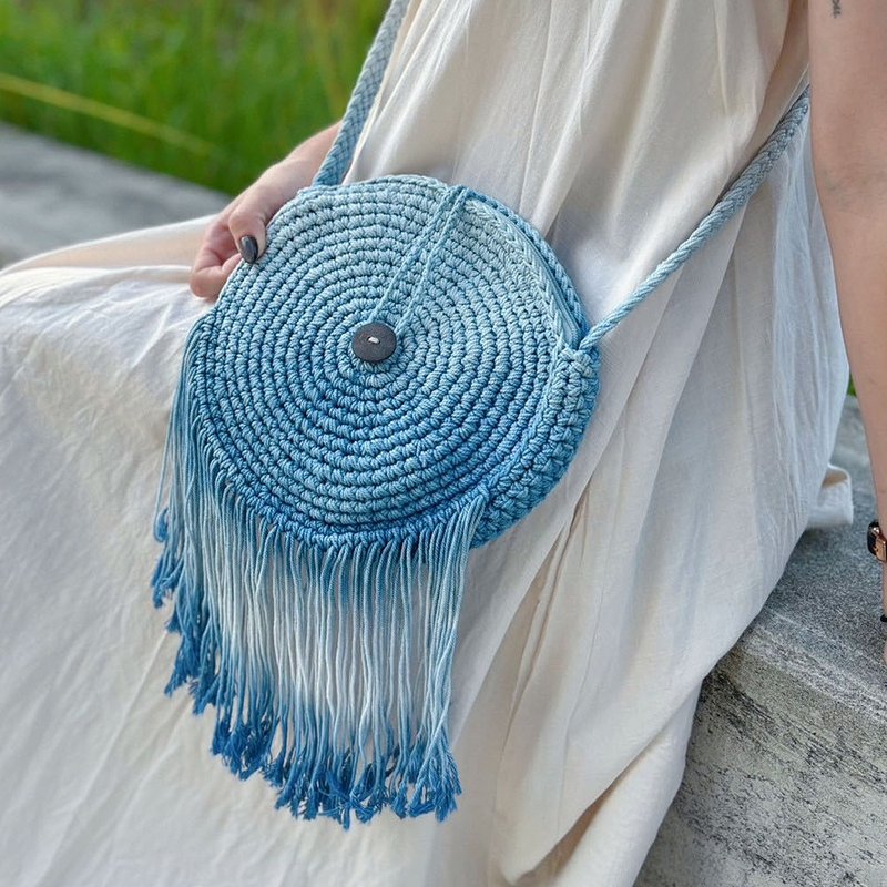 Go somewhere windy, blue dyed round tassel bag side backpack - กระเป๋าแมสเซนเจอร์ - ผ้าฝ้าย/ผ้าลินิน สีน้ำเงิน