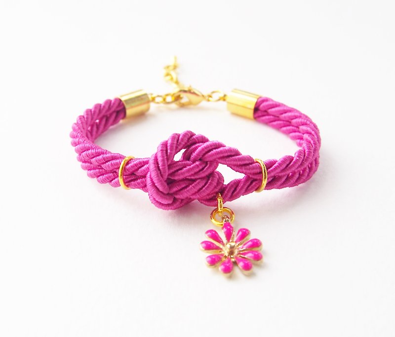 Pink knot rope bracelet + flower charm - สร้อยข้อมือ - วัสดุอื่นๆ สึชมพู