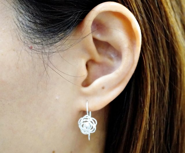 Silver rose dangle earrings
