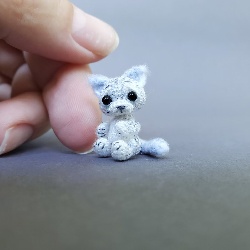 Extreme micro snow leopard. Dollhouse miniature. Micro stuffed irbis. Amigurumi.