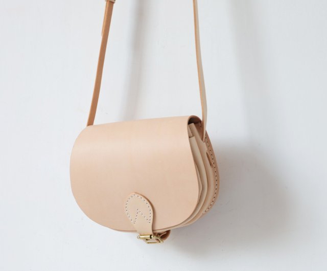 Cream best sale saddle bag