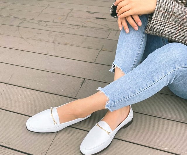 white loafers gold buckle