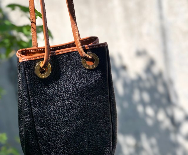 Celine Logo Embossed Small Bucket Bag in Brown