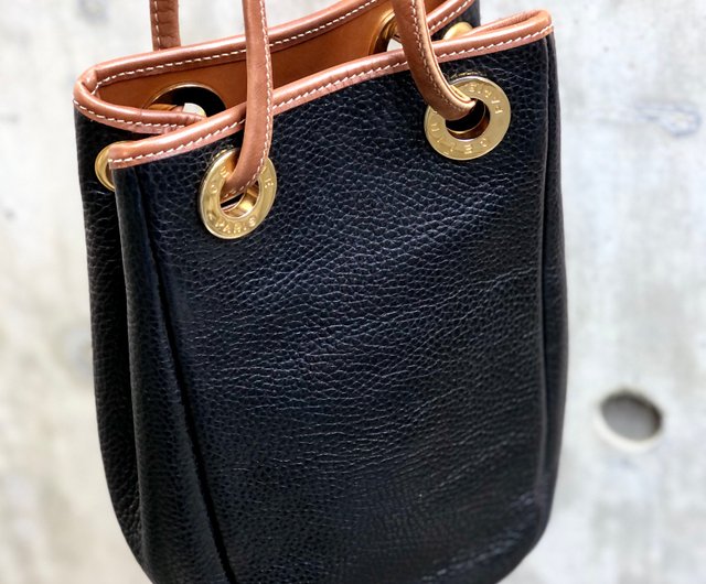 Celine Logo Embossed Small Bucket Bag in Brown