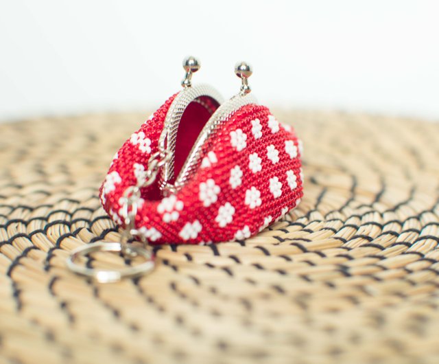 Red beaded coin purse with white dots.Polka dot wallet. Kiss lock